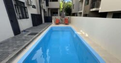 A louer appartement récent avec piscine commune, situé dans un quartier résidentiel calme à Flic-en-Flac.