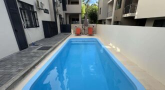 A louer appartement récent avec piscine commune, situé dans un quartier résidentiel calme à Flic-en-Flac.